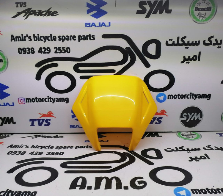 قاب زرد رنگ و مربعی دور چراغ جلو موتور تریل روان مدل قدیم